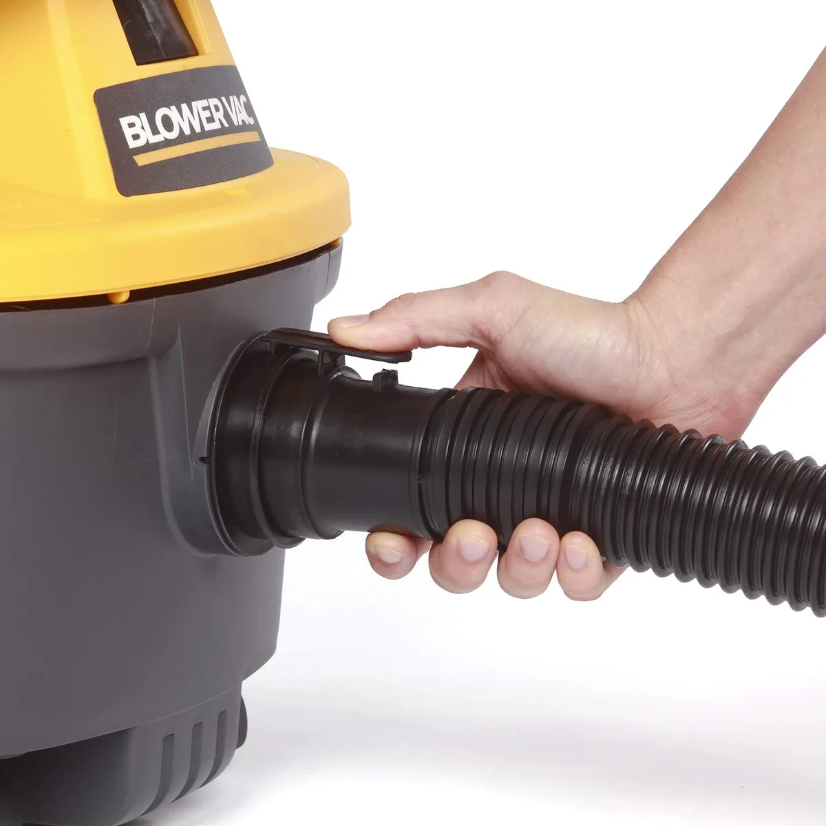How do you unclog a shop vacuum hose?